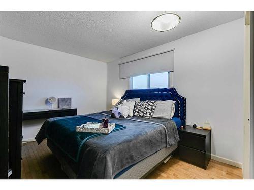 12112 Canfield Road Sw, Calgary, AB - Indoor Photo Showing Bedroom