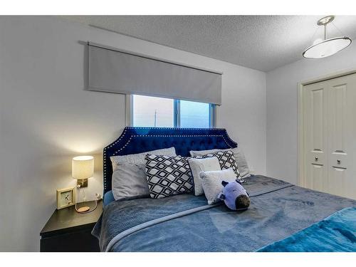 12112 Canfield Road Sw, Calgary, AB - Indoor Photo Showing Bedroom