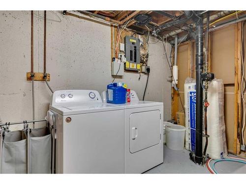 12112 Canfield Road Sw, Calgary, AB - Indoor Photo Showing Laundry Room