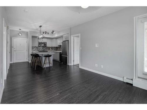 1312-3727 Sage Hill Drive Nw, Calgary, AB - Indoor Photo Showing Other Room