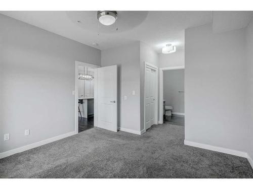 1312-3727 Sage Hill Drive Nw, Calgary, AB - Indoor Photo Showing Other Room