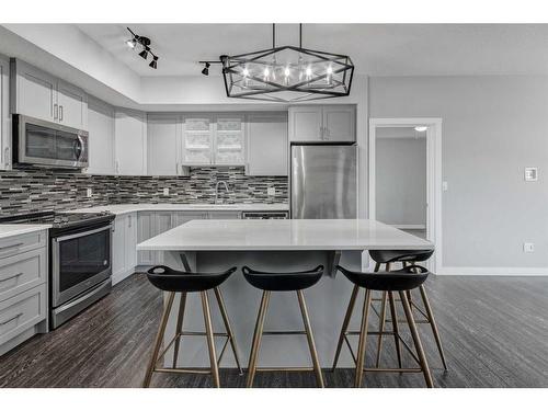 1312-3727 Sage Hill Drive Nw, Calgary, AB - Indoor Photo Showing Kitchen With Stainless Steel Kitchen With Upgraded Kitchen