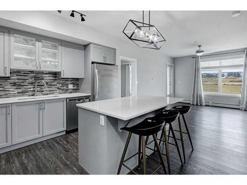 1312-3727 Sage Hill Drive Nw, Calgary, AB - Indoor Photo Showing Kitchen With Stainless Steel Kitchen With Upgraded Kitchen