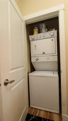 2102-5605 Henwood Street Sw, Calgary, AB - Indoor Photo Showing Laundry Room