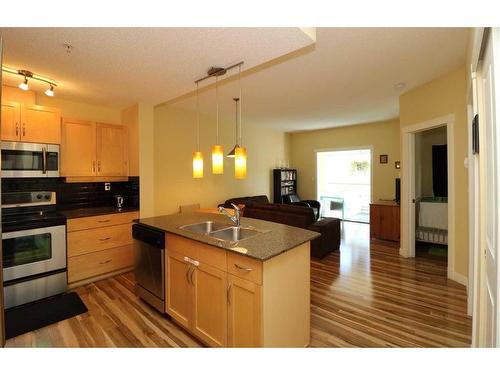 2102-5605 Henwood Street Sw, Calgary, AB - Indoor Photo Showing Kitchen With Double Sink