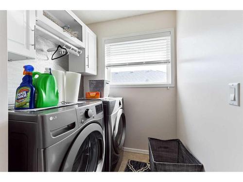 68 Hidden Ranch Crescent Nw, Calgary, AB - Indoor Photo Showing Laundry Room