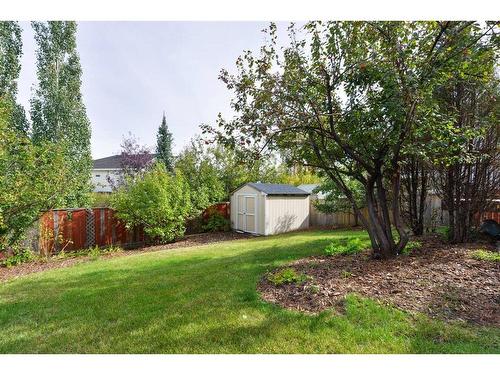 68 Hidden Ranch Crescent Nw, Calgary, AB - Outdoor With Backyard