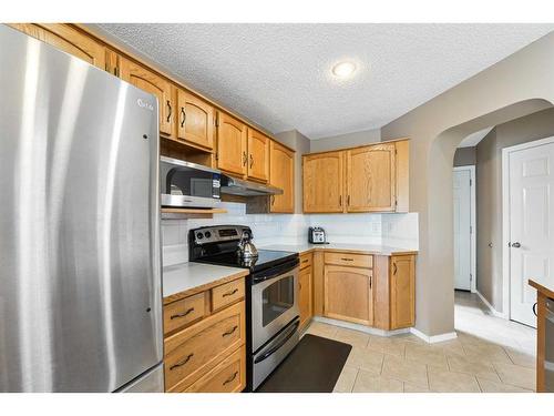 68 Hidden Ranch Crescent Nw, Calgary, AB - Indoor Photo Showing Kitchen With Stainless Steel Kitchen