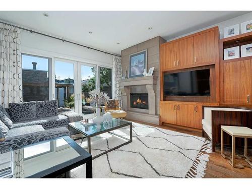 2031 49 Avenue Sw, Calgary, AB - Indoor Photo Showing Living Room With Fireplace