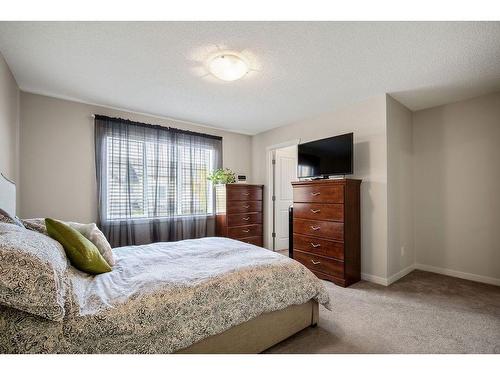 53 Copperpond Landing Se, Calgary, AB - Indoor Photo Showing Bedroom