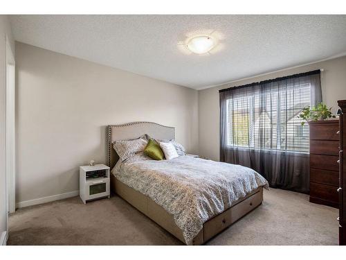 53 Copperpond Landing Se, Calgary, AB - Indoor Photo Showing Bedroom