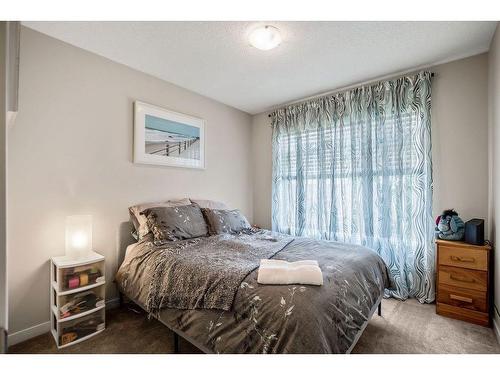 53 Copperpond Landing Se, Calgary, AB - Indoor Photo Showing Bedroom