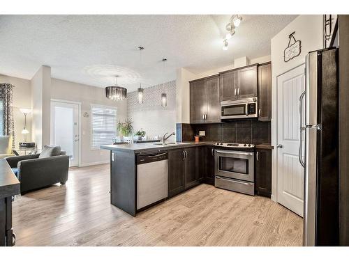 53 Copperpond Landing Se, Calgary, AB - Indoor Photo Showing Kitchen