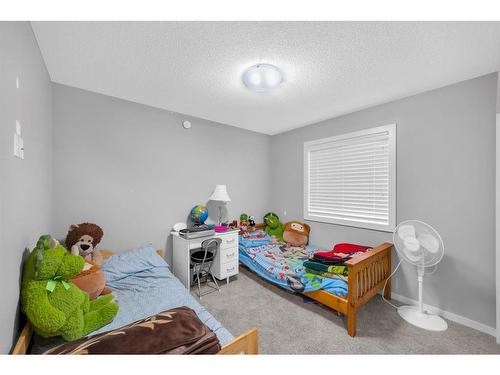 29 Evansridge Place Nw, Calgary, AB - Indoor Photo Showing Bedroom