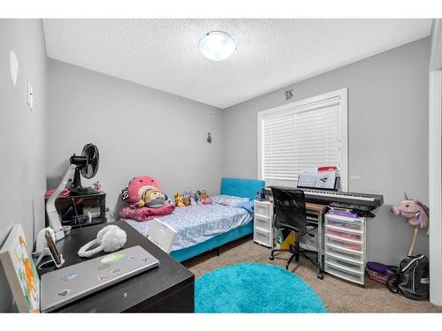 29 Evansridge Place Nw, Calgary, AB - Indoor Photo Showing Bedroom