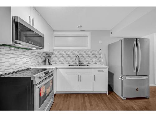 29 Evansridge Place Nw, Calgary, AB - Indoor Photo Showing Kitchen With Double Sink With Upgraded Kitchen