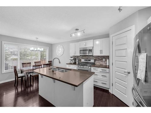 29 Evansridge Place Nw, Calgary, AB - Indoor Photo Showing Kitchen With Double Sink