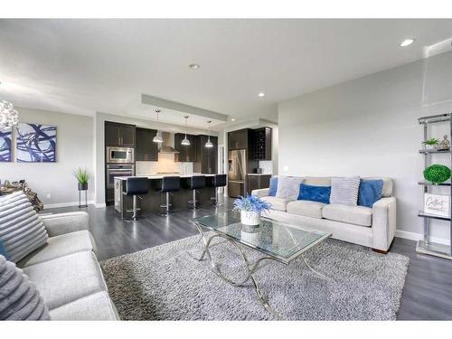 239 Hillcrest Heights Sw, Airdrie, AB - Indoor Photo Showing Living Room