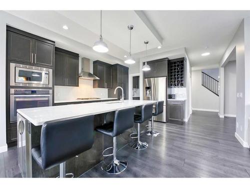 239 Hillcrest Heights Sw, Airdrie, AB - Indoor Photo Showing Kitchen With Stainless Steel Kitchen With Upgraded Kitchen