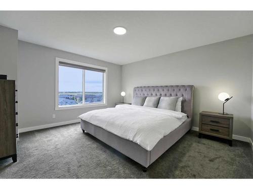 239 Hillcrest Heights Sw, Airdrie, AB - Indoor Photo Showing Bedroom