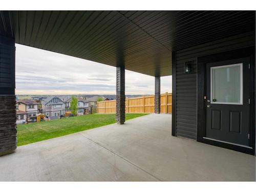 239 Hillcrest Heights Sw, Airdrie, AB - Outdoor With Deck Patio Veranda With Exterior