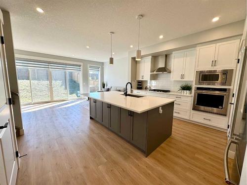 168 Arbour Lake Hill Nw, Calgary, AB - Indoor Photo Showing Kitchen With Upgraded Kitchen