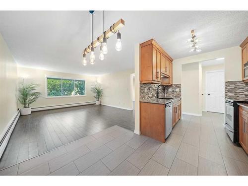 101-1513 26 Avenue Sw, Calgary, AB - Indoor Photo Showing Kitchen