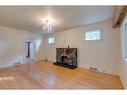 228 22 Avenue Nw, Calgary, AB  - Indoor With Fireplace 