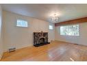 228 22 Avenue Nw, Calgary, AB  - Indoor With Fireplace 