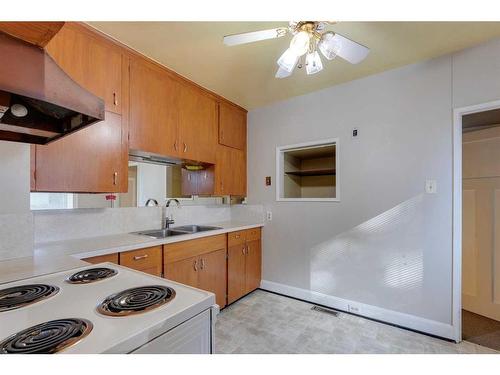 228 22 Avenue Nw, Calgary, AB - Indoor Photo Showing Kitchen With Double Sink