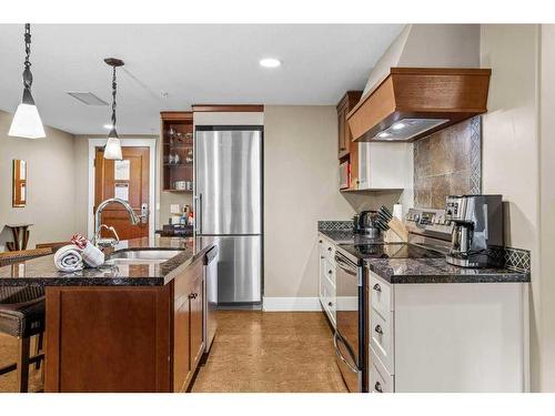 314-187 Kananaskis Way, Canmore, AB - Indoor Photo Showing Kitchen With Stainless Steel Kitchen With Double Sink With Upgraded Kitchen