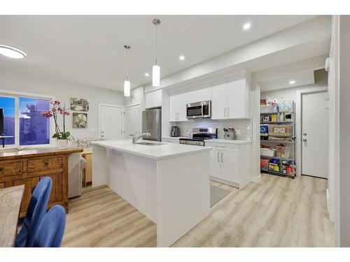 380 Canals Crossing Sw, Airdrie, AB - Indoor Photo Showing Kitchen With Upgraded Kitchen