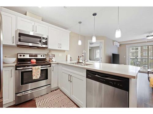 2207-450 Sage Valley Drive Nw, Calgary, AB - Indoor Photo Showing Kitchen With Double Sink With Upgraded Kitchen