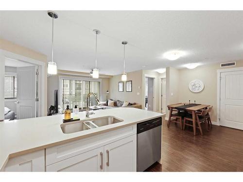 2207-450 Sage Valley Drive Nw, Calgary, AB - Indoor Photo Showing Kitchen With Double Sink With Upgraded Kitchen