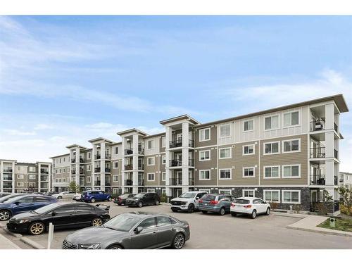 2207-450 Sage Valley Drive Nw, Calgary, AB - Outdoor With Facade