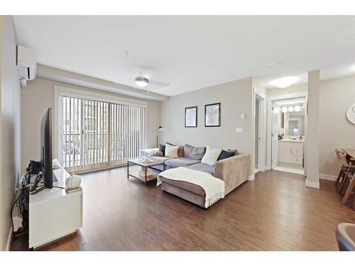 2207-450 Sage Valley Drive Nw, Calgary, AB - Indoor Photo Showing Living Room