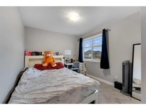 247 Kinniburgh Road, Chestermere, AB - Indoor Photo Showing Bedroom