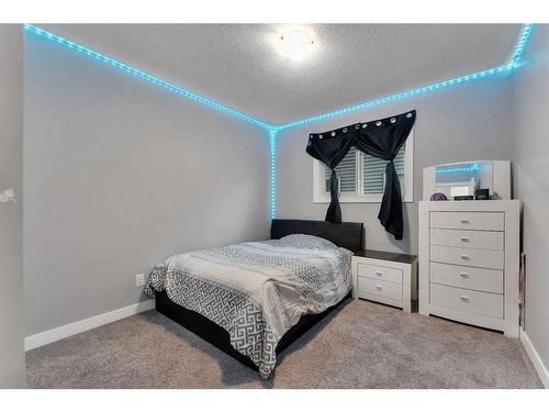 247 Kinniburgh Road, Chestermere, AB - Indoor Photo Showing Bedroom