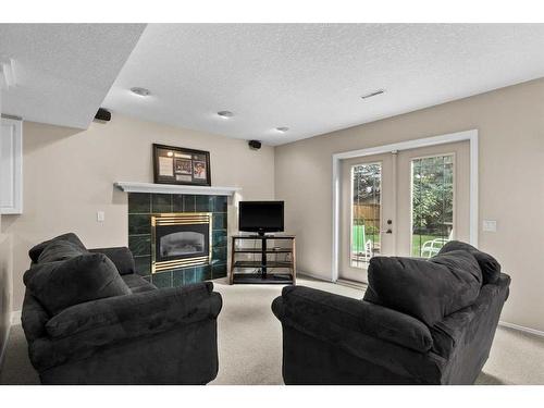 492 Silvergrove Gardens Nw, Calgary, AB - Indoor Photo Showing Living Room With Fireplace