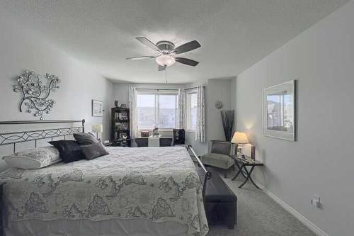 1212-7451 Springbank Boulevard Sw, Calgary, AB - Indoor Photo Showing Bedroom