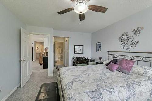 1212-7451 Springbank Boulevard Sw, Calgary, AB - Indoor Photo Showing Bedroom