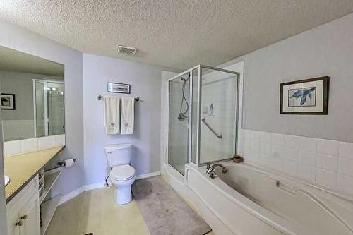 1212-7451 Springbank Boulevard Sw, Calgary, AB - Indoor Photo Showing Bathroom