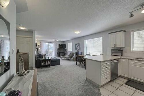 1212-7451 Springbank Boulevard Sw, Calgary, AB - Indoor Photo Showing Kitchen