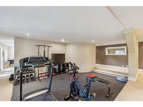 39 Anatapi Lane Sw, Calgary, AB - Indoor Photo Showing Gym Room