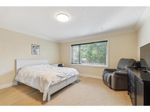 39 Anatapi Lane Sw, Calgary, AB - Indoor Photo Showing Bedroom