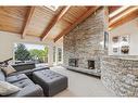 39 Anatapi Lane Sw, Calgary, AB  - Indoor Photo Showing Living Room With Fireplace 