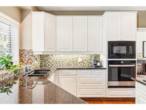 515 Sierra Morena Place Sw, Calgary, AB - Indoor Photo Showing Kitchen With Double Sink With Upgraded Kitchen