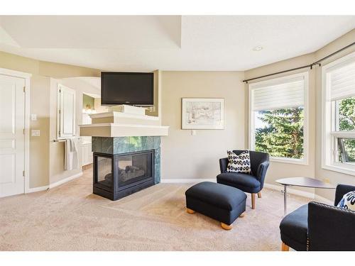 515 Sierra Morena Place Sw, Calgary, AB - Indoor Photo Showing Living Room With Fireplace