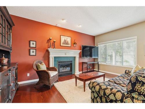 515 Sierra Morena Place Sw, Calgary, AB - Indoor Photo Showing Living Room With Fireplace