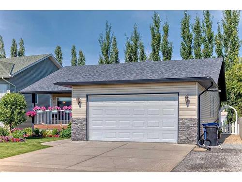 526 Carriage Lane Drive, Carstairs, AB - Outdoor With Deck Patio Veranda